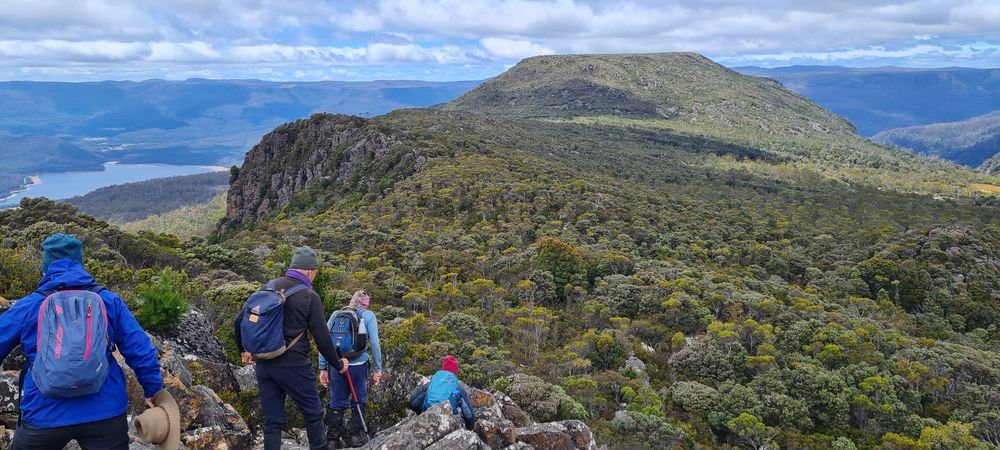 Heading down the loop track with Huntsman Lake, Meander Dam and Mother Cummings Head in view. Heading down the loop track with Huntsman Lake, Meander Dam and Mother Cummings Head in view.