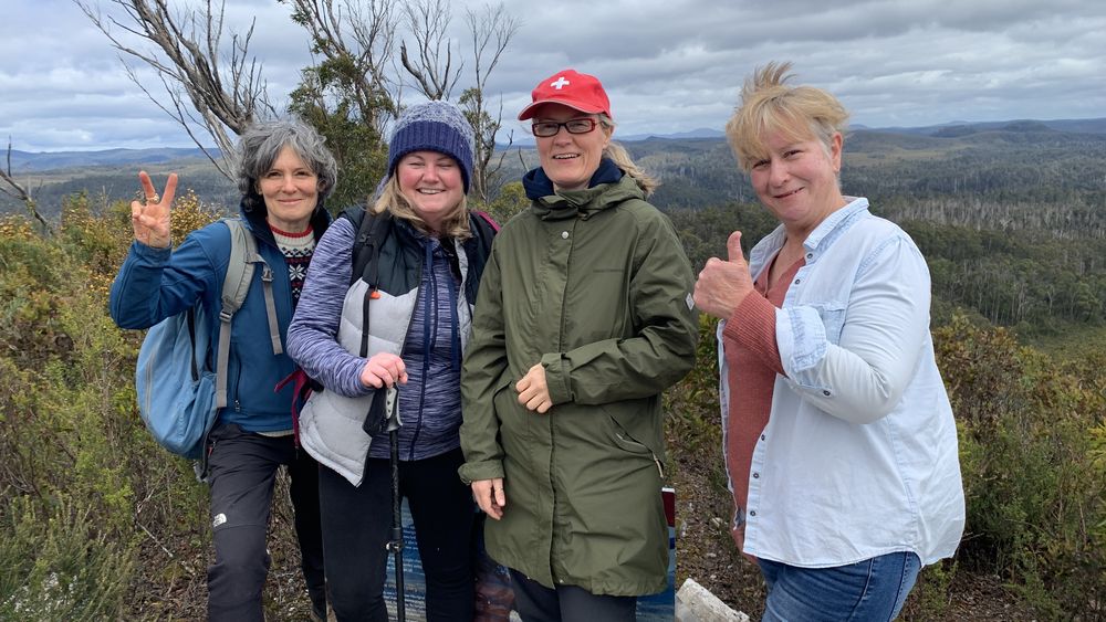 The girls give the thumbs up. The girls give the thumbs up.